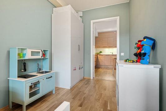 A kitchen with a stove top oven sitting inside of it